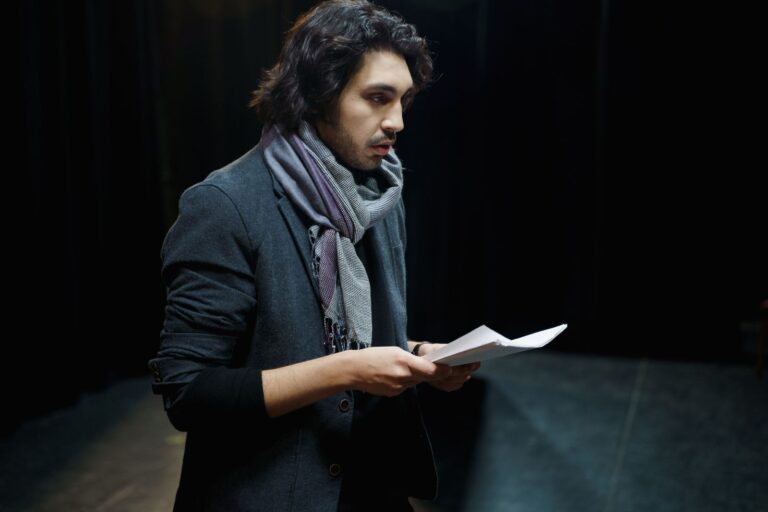 Actor rehearsing lines on a theater stage